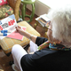 A Celebrex fan looks over paperwork for her membership in the new Columbia House program.
